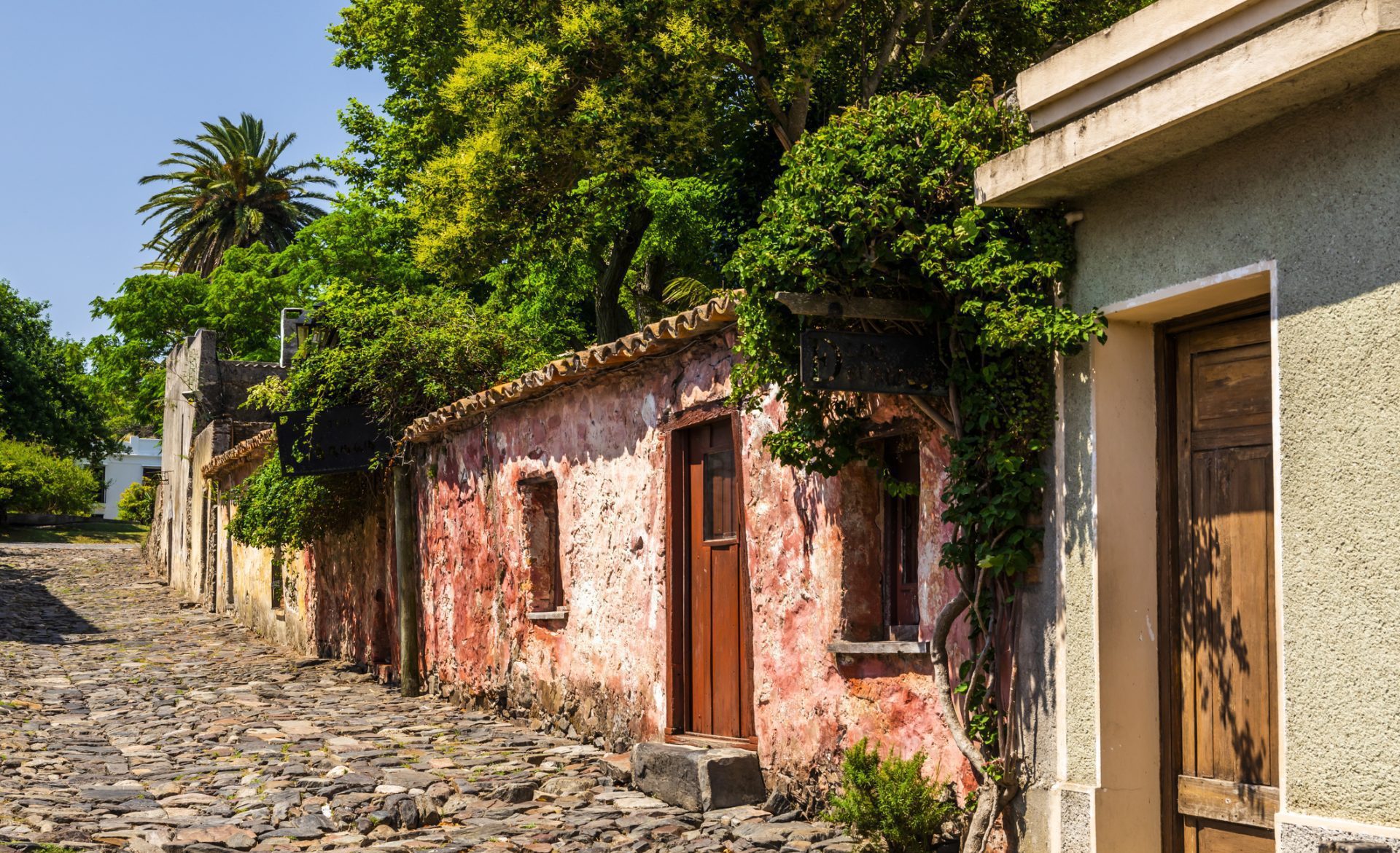 Colonial street and houses at summer day. Colonia del Sacramento. Uruguay.